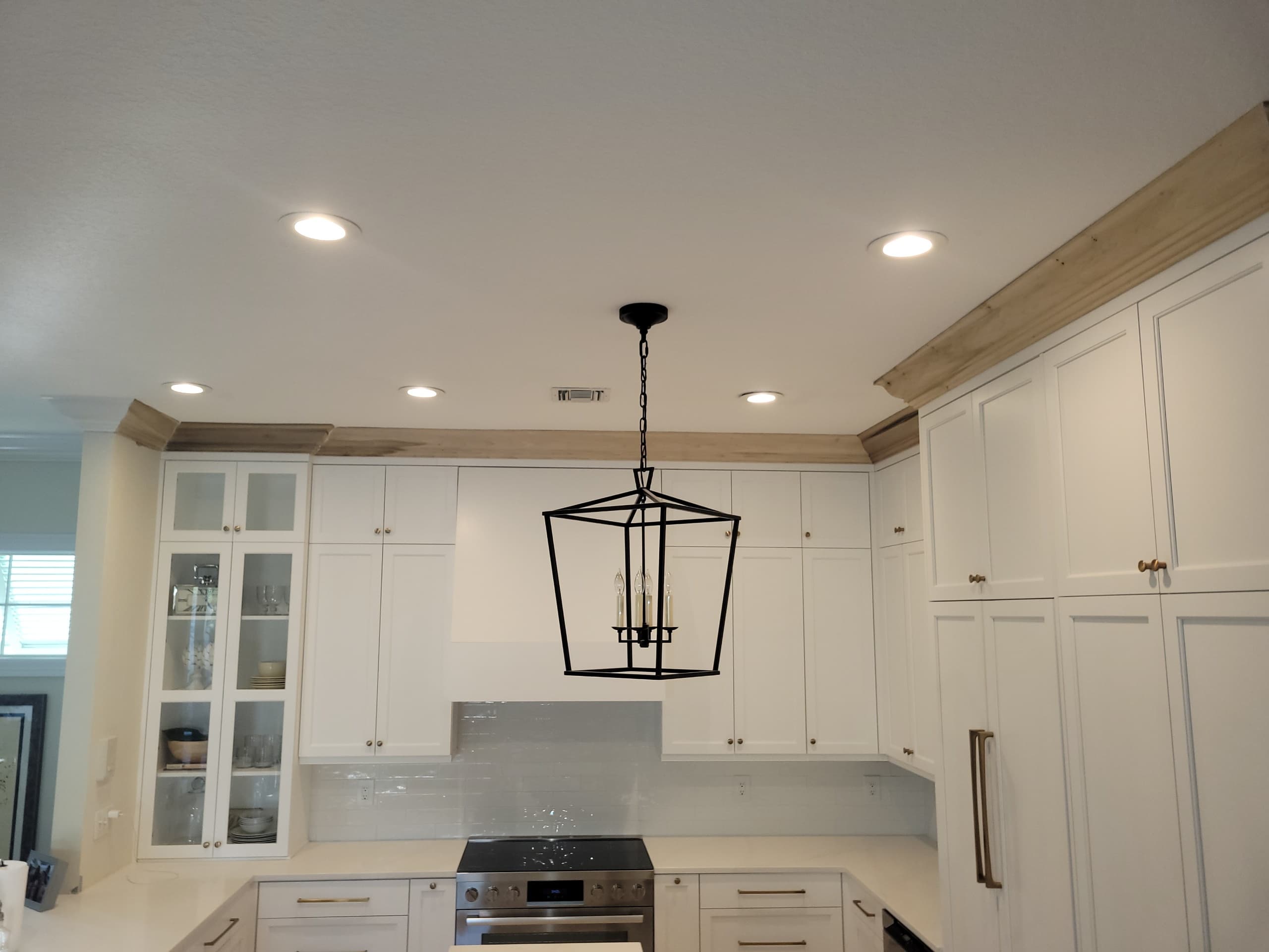 White kitchen with pendant lighting